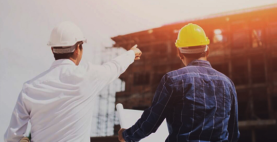 General contractors reviewing an industrial construction project in Ontario